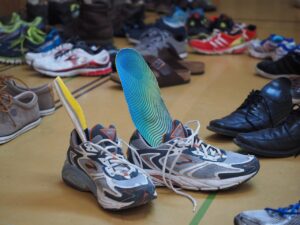 difference between insoles and orthotics